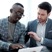 two business partners use a digital tablet. business partners use a digital tablet.photo with copy space